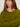 A woman with long brown hair wears the Sanctuary Clothing "must have cardi" in martini olive, featuring two buttons, and stands with her arms crossed against a plain background, looking directly at the camera.