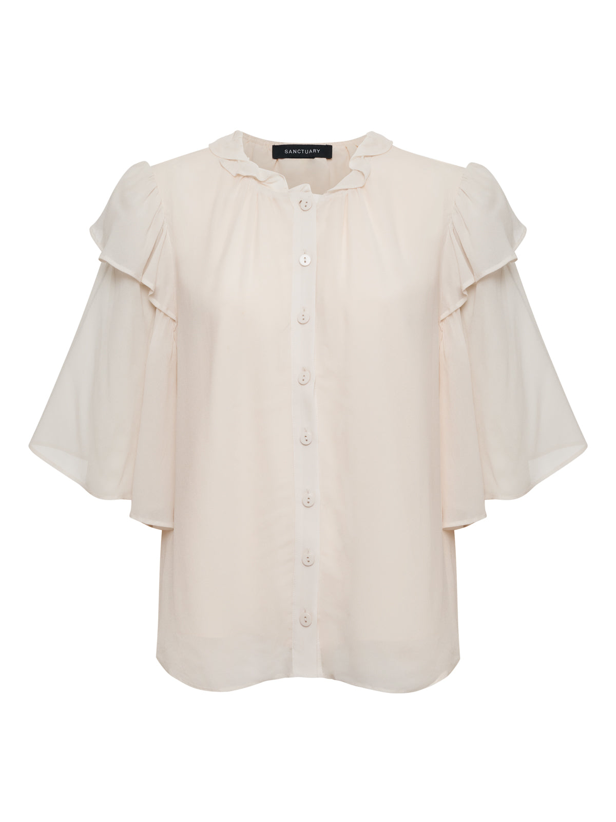 The Deja Vu Blouse Light Oat by Sanctuary Clothing features short sleeves, shoulder ruffles, a button-down front, and a subtle ruffled collar in a cream hue, shown against a white background.
