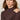 A woman with long brown hair wears the Sanctuary Clothing ls mock essential top in semi sweet, looking at the camera with her left hand on her right shoulder against a neutral background.