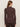 A person with long brown hair is shown from the back against a plain light background, wearing Sanctuary Clothing’s ls mock essential top semi sweet and matching pants.