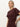 A woman with blonde hair in a low ponytail wears the Sanctuary Clothing cinched waist t shirt dress in chicory. She stands against a light background, one hand on her hip and a neutral expression.