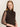 A woman with fair skin and straight, light brown hair models the Sanctuary Clothing night out mock sweater dress semi sweet, posing against a plain, light background.