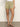 A person models Sanctuary Clothing's liner short bamboo, paired with a white top and heeled sandals, against a plain light background. Only the lower half of their body is visible in the photo.