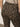 A person seen from the back, waist down, wears Sanctuary Clothing's carnaby kick crop leggings in the French Kitty leopard print with a light-colored top.