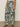 Someone wearing Sanctuary Clothing's the soft trouser green oasis (extended sizing) paired with black heeled sandals, standing against a plain background.