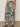 Someone wearing Sanctuary Clothing's the soft trouser green oasis (extended sizing) paired with black heeled sandals, standing against a plain background.