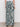 Someone wearing Sanctuary Clothing's "the soft trouser green oasis" pants, seen from the back against a plain background.