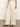 Someone wearing the Sanctuary Clothing "Linen Marine Wide Leg Birch" pants, which are high-waisted and wide-leg with a front pocket, paired with brown sandals. They're standing on a smooth floor against a plain white background.