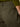 Close-up of a person wearing the Sanctuary Clothing "boyfriend utility pant kalamata," featuring olive green fabric, a back pocket, and a black Sanctuary tag, paired with a green sweater.