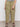 A person wearing Sanctuary Clothing™s area standard rise pant bamboo extended sizing in olive, paired with black strappy sandals, stands against a plain light background. Only the lower half of their body is visible.