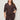 A woman with long brown hair wears the Sanctuary Clothing textured knit Dreamgirl Top in Semi Sweet (extended sizing) with matching brown pants, standing against a plain light-colored background.