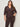 A woman with long brown hair wears the Sanctuary Clothing textured knit Dreamgirl Top in Semi Sweet (extended sizing) with matching brown pants, standing against a plain light-colored background.