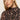 A woman with fair skin and straight blonde hair models the Sanctuary Clothing long sleeve mesh mock top nocturnal, featuring a black and pink pattern, along with small gold hoops against a plain light background.