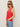 A woman with long, straight hair wears aviator sunglasses, light blue jeans, and the Sanctuary Clothing mesh stitch shell sweater in cayenne, standing against a plain beige background.
