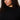 A woman with curly dark hair and natural makeup models the Sanctuary Clothing forever cashmere popover in black extended sizing, gazing confidently at the camera against a plain light background.