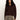 A woman with curly dark hair wears the Sanctuary Clothing boucle cardi in dark crimson and light brown corduroy pants, standing against a plain light background.