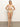 A person stands barefoot, arms gently crossed, against a plain background wearing Sanctuary Clothing's "charming floral waist high leg white" bikini with pink and green patterns. Their expression is neutral, and they have long, straight hair.