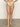 A model showcases Sanctuary Clothing's charming floral high-leg bikini bottom in pink, green, and blue against a neutral backdrop.