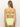 A woman with long, straight hair is shown from the back wearing Sanctuary Clothing™s Stay Connected High Rise Bikini Bottom in Daiquiri and a matching one-shoulder top against a plain, off-white background.