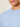 Close-up of a person wearing the Sanctuary Clothing perfect sweater tee in blue powder (extended sizing), showing only their lower face, neck, and upper shoulders against a neutral, blurred background.