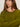 A woman with long brown hair wears the Sanctuary Clothing "must have cardi" in martini olive, featuring two buttons, and stands with her arms crossed against a plain background, looking directly at the camera.