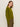 A woman with long, straight brown hair models the Sanctuary Clothing "must have cardi" in martini olive, paired with matching green pants, against a plain light backdrop, standing slightly turned to the side.