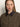 A woman with straight blonde hair and fair skin wears the Sanctuary Clothing barn jacket in burnt olive, featuring a dark corduroy collar and front zipper, looking directly at the camera with a neutral expression.