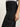 A close-up of a person wearing Sanctuary Clothing's Sculpted Hayden Bootcut Black pants, styled with a white top. The high-waisted pants feature prominent seams and a side flap pocket, with the person's right hand resting by their side.