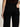 Shown from the waist down and viewed from behind, a person wears Sanctuary Clothing’s runway ponte trouser in black, with one hand on their hip and the other arm relaxed by their side.