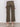 A person faces away, wearing Sanctuary Clothing's league crop fatigue pants in olive with back pockets, a striped long-sleeve top, and light woven shoes.