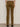 A person stands against a light wall, shown from the waist down and viewed from behind, wearing Sanctuary Clothing's velveteen brook bootcut pant in dirty martini with back pockets and black heeled shoes.