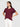 A woman with long dark hair wears the Sanctuary Clothing perfect tee remix night berry and white high-waisted pants, standing with hands on hips against a plain light background.