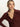 A woman with blonde hair tied back wears the Sanctuary Clothing long sleeve textured top in chicory. She faces forward with a neutral expression against a plain light background.