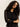 A woman with curly hair models the Sanctuary Clothing fitted mesh button down top in black, standing against a light neutral background with her arms crossed and head slightly tilted as she looks at the camera.