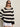 A woman in Sanctuary Clothing's textured raglan crew chalk black stripe 6 poses against a plain background, wearing dark sunglasses, white shorts, hoop earrings, and has straight light brown hair.