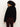 A woman with curly dark hair models the Sanctuary Clothing forever cashmere popover in black, standing with her back to the camera against a plain light background.