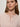 A woman with light skin and long brown hair wears Sanctuary Clothing's must have cardi in heather rose, styled with two buttons fastened at the collar. She also wears gold hoop earrings and gazes slightly past the camera with a neutral expression.