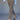 A person wearing Sanctuary Clothing cadence 90 straight crop jeans in french kitty leopard print, paired with a light blue sweater and black pointed-toe heels, walks against a plain background. Only the lower half is visible.